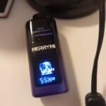 Fotografija mnenja za Merrymi PANDA Mecha pro – Disposable Vape z Dvema Ločenima Okusoma, Drsnim Preklopom in Panda Zaslonom | SloveniaVape